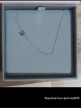 Maya Brenner asymmetrical 14k white gold “M” initial necklace.
